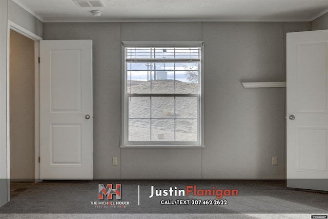 interior space featuring crown molding