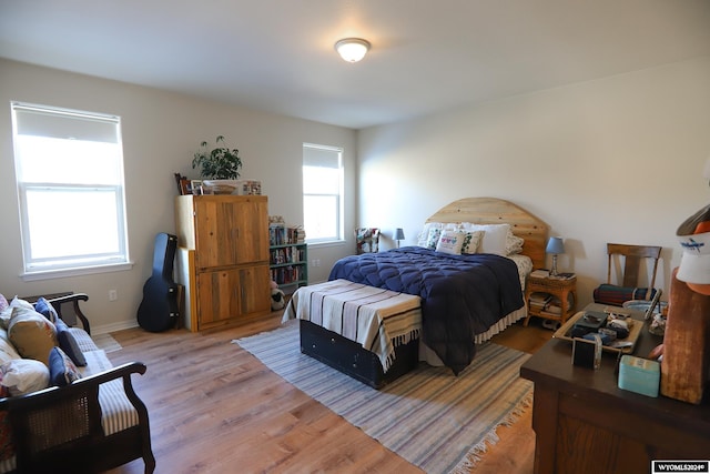 bedroom featuring hardwood / wood-style floors