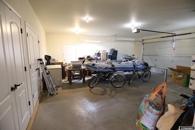 garage featuring a garage door opener