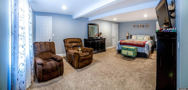 bedroom featuring carpet and beam ceiling