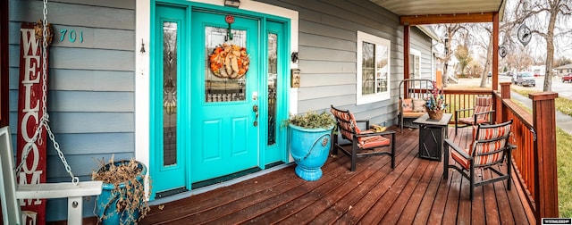 property entrance with a porch