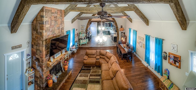 living room with ceiling fan, dark hardwood / wood-style flooring, and beamed ceiling