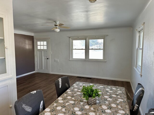 1323 Cherry St, Rawlins, WY 82301 - dining space featuring a ceiling fan and wood finished floors