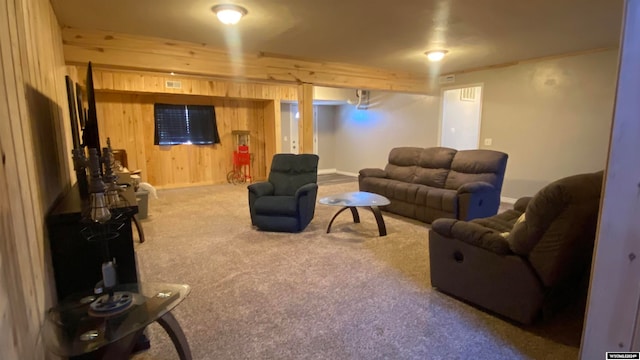 living room with carpet and wooden walls