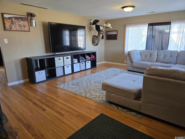 living room with hardwood / wood-style flooring