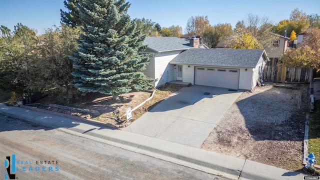 view of front of property featuring a garage