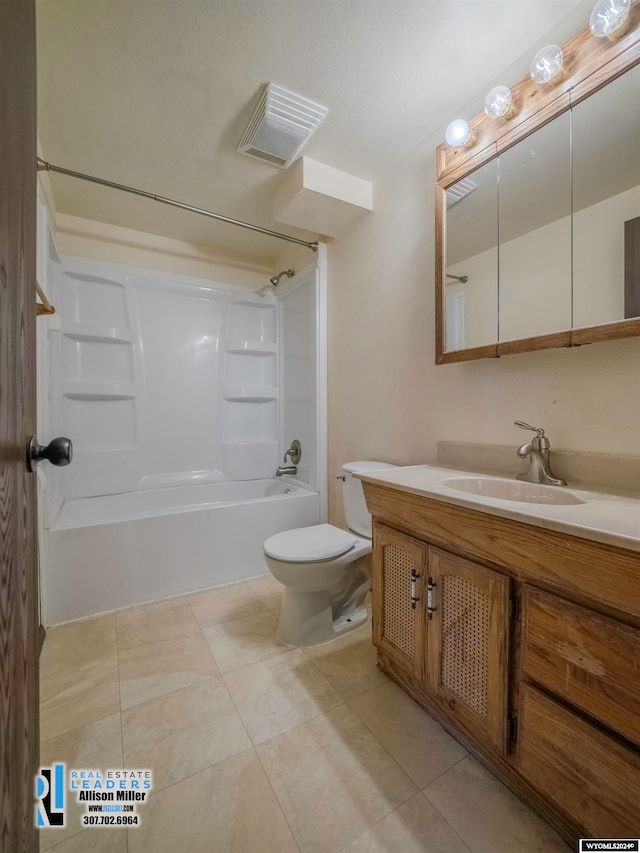 full bathroom with tile patterned flooring, shower / bathing tub combination, vanity, and toilet