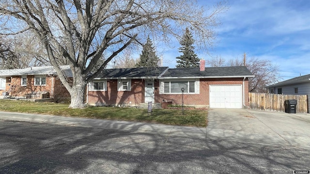 single story home with a garage