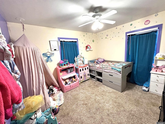 carpeted bedroom with ceiling fan