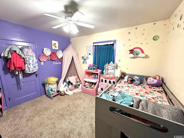 bedroom with ceiling fan and carpet floors