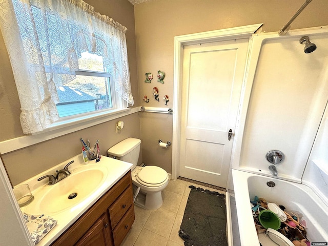 full bathroom with toilet, vanity, tile patterned floors, and washtub / shower combination