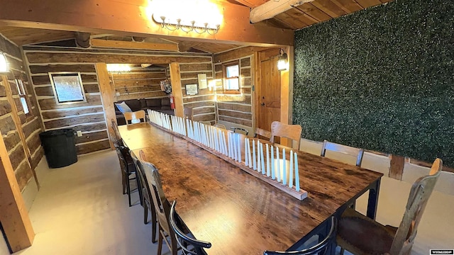 dining room with wooden walls