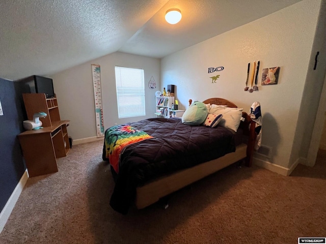 bedroom with dark colored carpet, a textured ceiling, and lofted ceiling