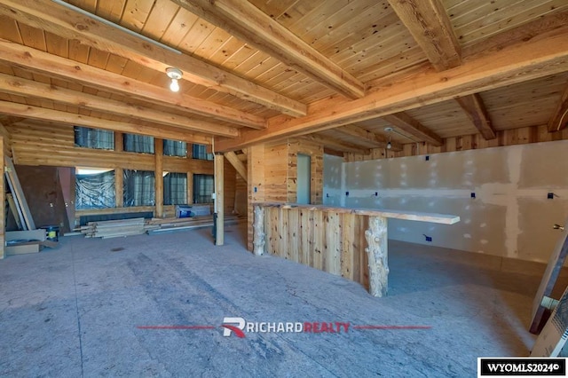 misc room featuring beam ceiling and wood ceiling