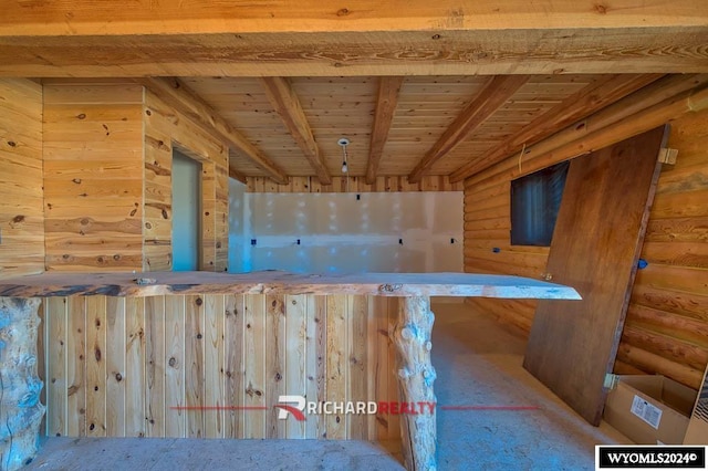 311 Bridge Ave, Worland, WY 82401 - additional living space featuring a wooden ceiling with exposed beams and rustic walls