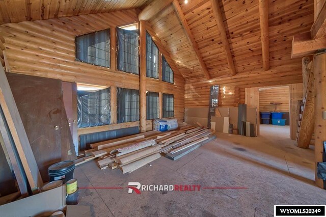 311 Bridge Ave, Worland, WY 82401 - interior space with high vaulted ceiling and a wood ceiling with exposed beams