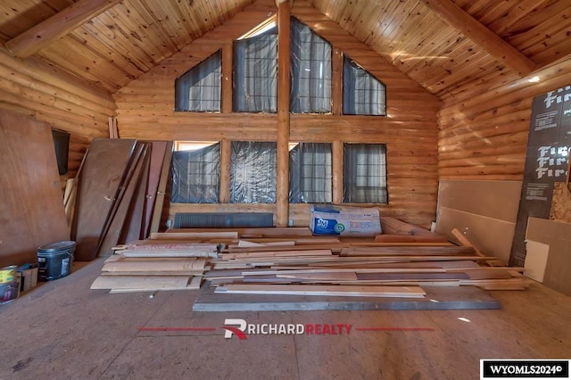 311 Bridge Ave, Worland, WY 82401 - interior space featuring log walls, a wooden ceiling with exposed beams, and high vaulted ceiling