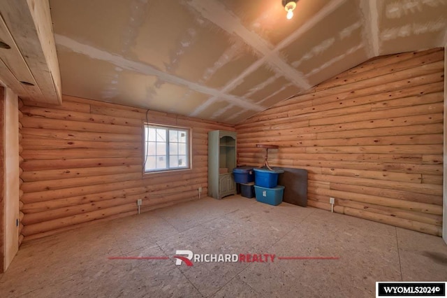 bonus room featuring vaulted ceiling