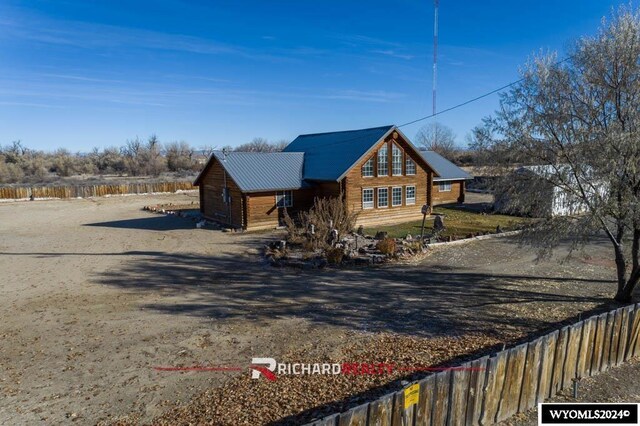 311 Bridge Ave, Worland, WY 82401 - view of front of house with a metal roof