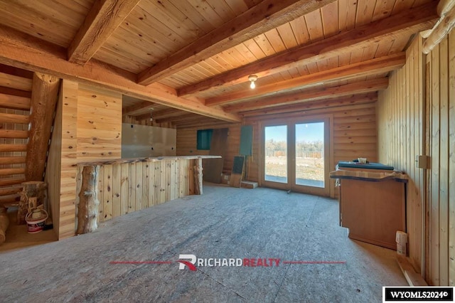 interior space featuring beamed ceiling and wood ceiling