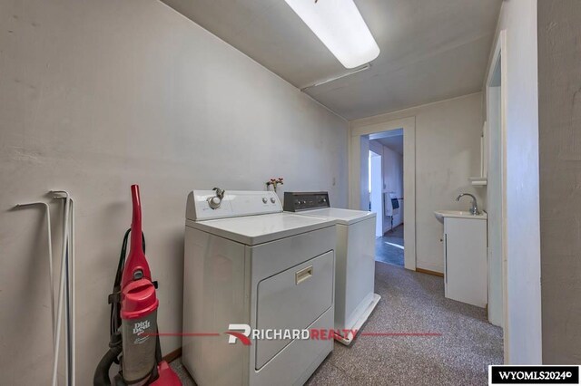 323 Bridge Ave, Worland, WY 82401 - laundry room featuring washing machine and dryer