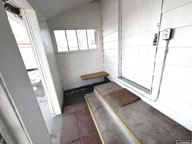 bathroom with vaulted ceiling