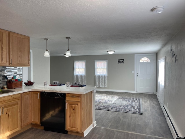 kitchen featuring dishwasher, a textured ceiling, dark hardwood / wood-style floors, and a baseboard heating unit