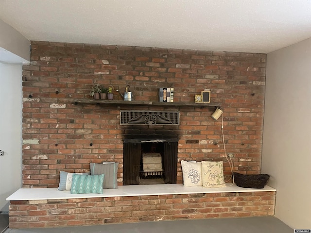 room details with a fireplace and a textured ceiling