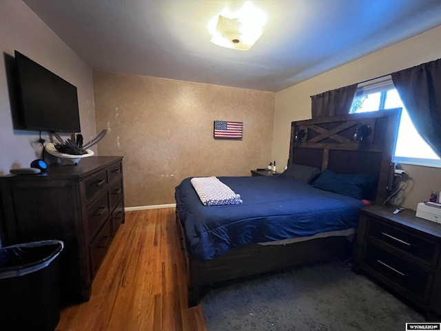 bedroom featuring wood-type flooring