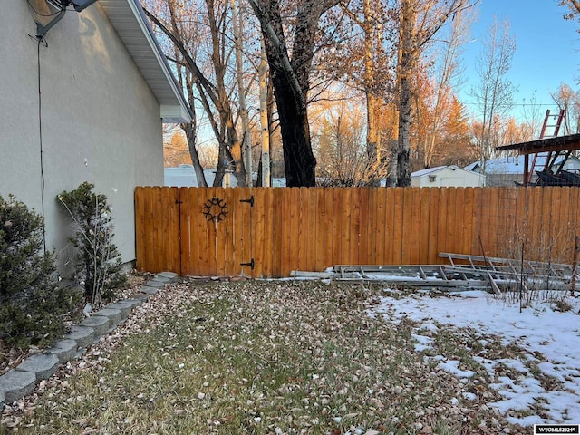 view of yard covered in snow