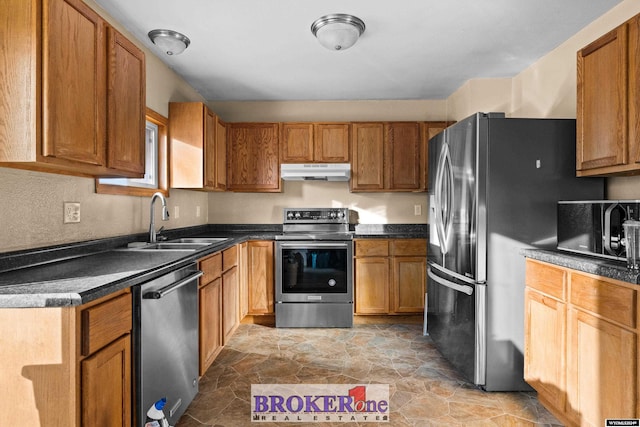 kitchen with sink and appliances with stainless steel finishes