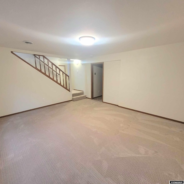 basement with light carpet