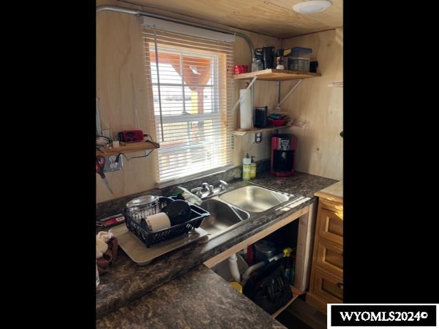 kitchen featuring wooden ceiling