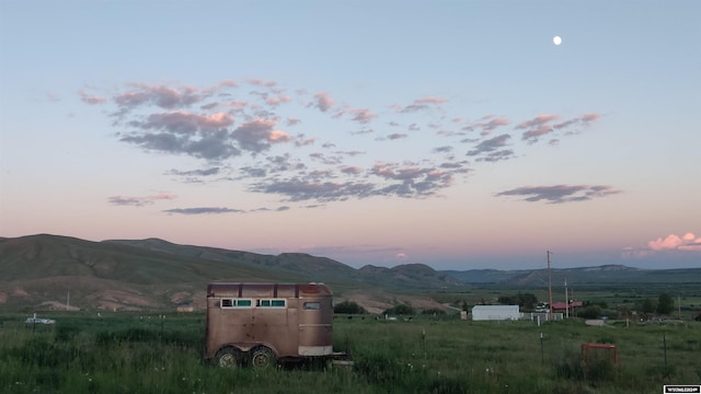 property view of mountains with a rural view