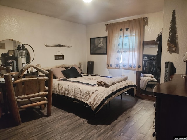 bedroom with light hardwood / wood-style floors