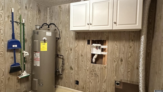 utility room with electric water heater