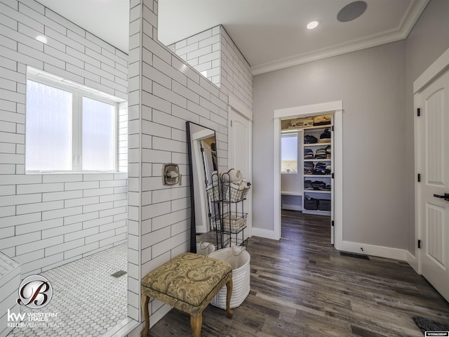 bathroom featuring hardwood / wood-style floors and ornamental molding