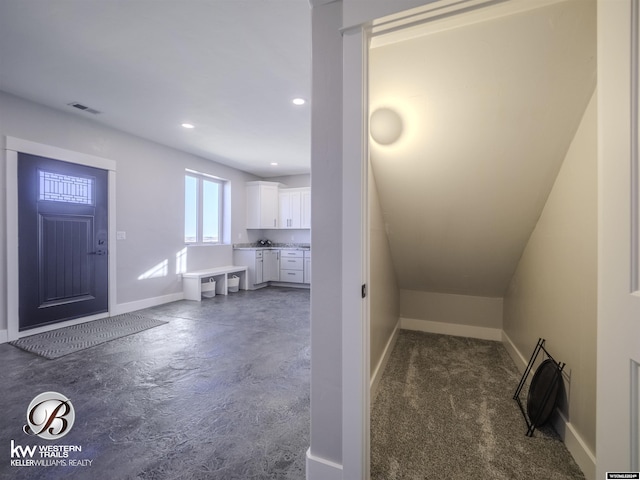 washroom featuring dark colored carpet