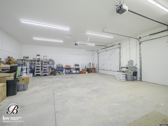 garage featuring a garage door opener