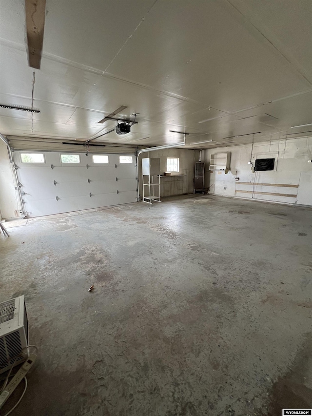 610 Charles St, Douglas, WY 82633 - garage featuring a garage door opener