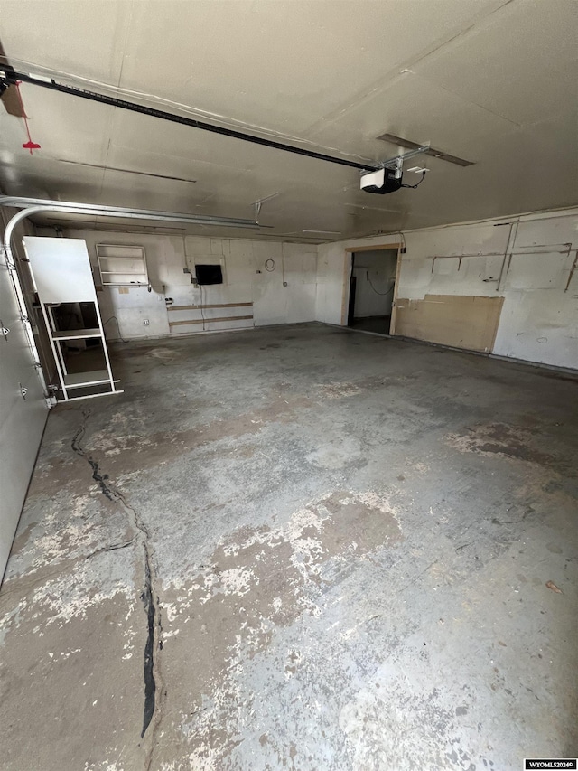 610 Charles St, Douglas, WY 82633 - garage featuring a garage door opener