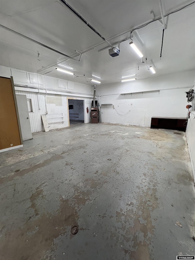 610 Charles St, Douglas, WY 82633 - garage featuring a garage door opener