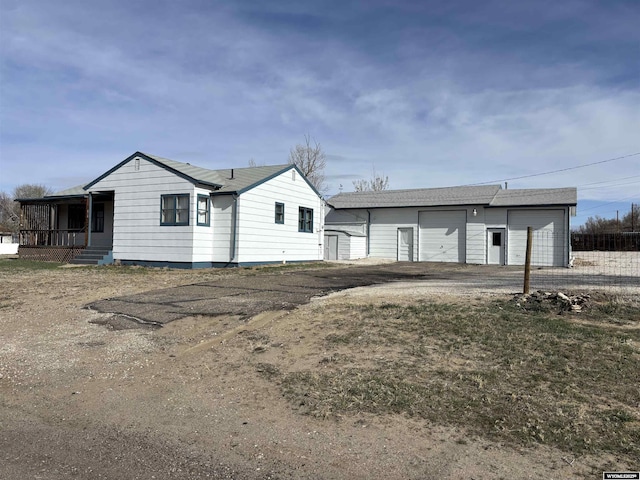 610 Charles St, Douglas, WY 82633 - view of front of property featuring an outbuilding and a garage