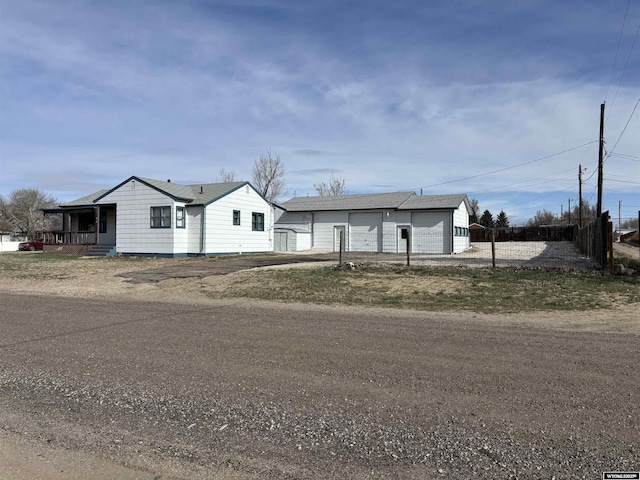 610 Charles St, Douglas, WY 82633 - single story home featuring an outdoor structure and a garage