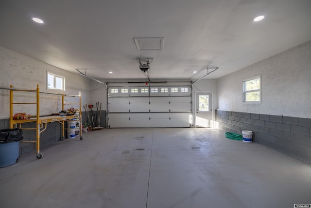 garage featuring a garage door opener