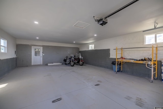 garage featuring a garage door opener