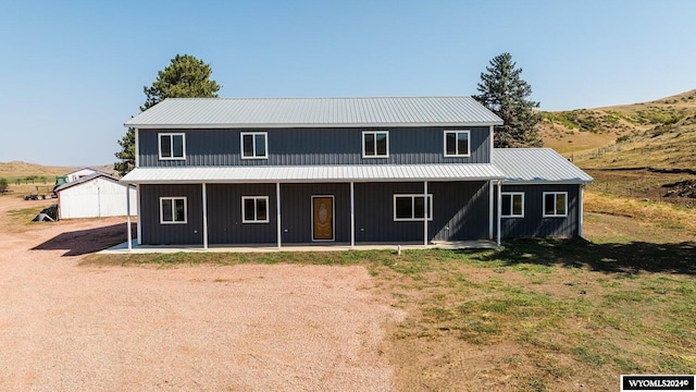 view of front of house with a mountain view