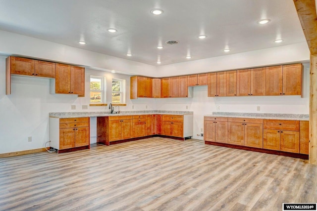 kitchen featuring sink and light hardwood / wood-style floors