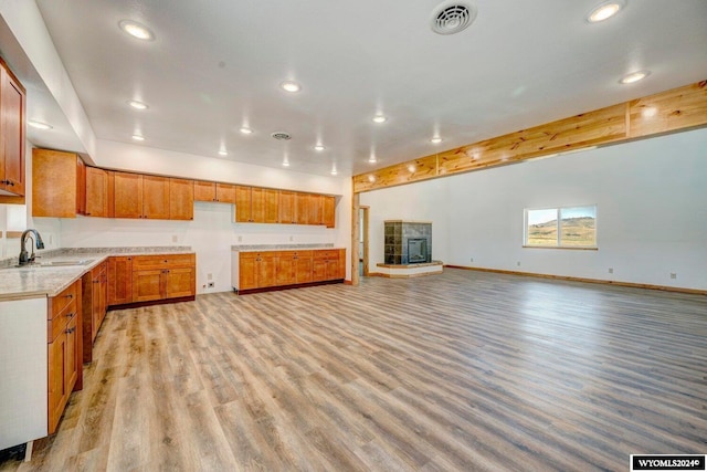 kitchen featuring sink and light wood-type flooring