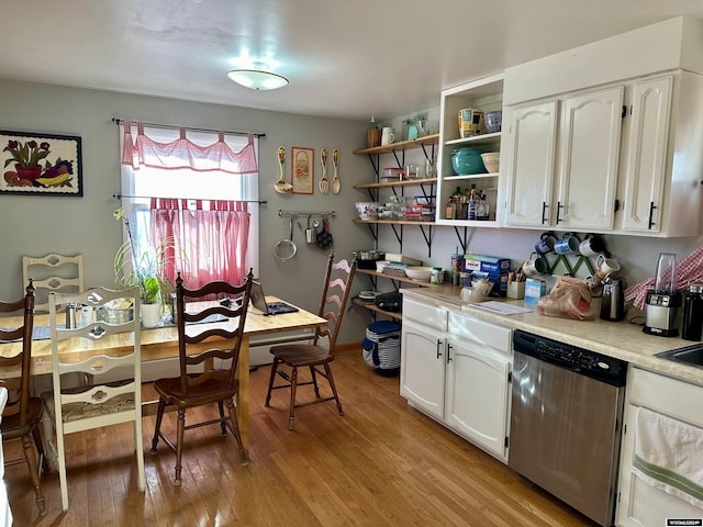 kitchen with dishwasher, white cabinets, and light wood-type flooring